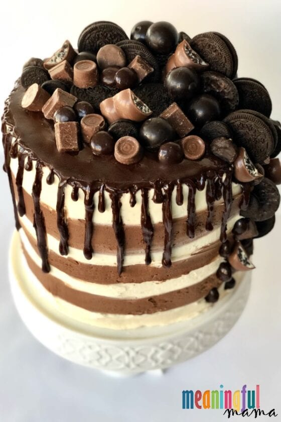 7 Layer Oreo Mousse Cake with Chocolate Candy and Cookie Topping