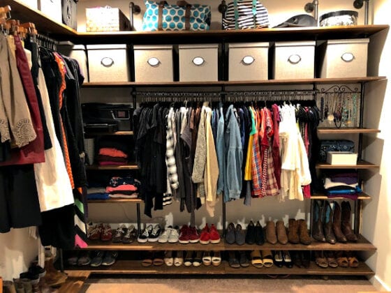 DIY Industrial Pipe Walk-In Closet with Clothes